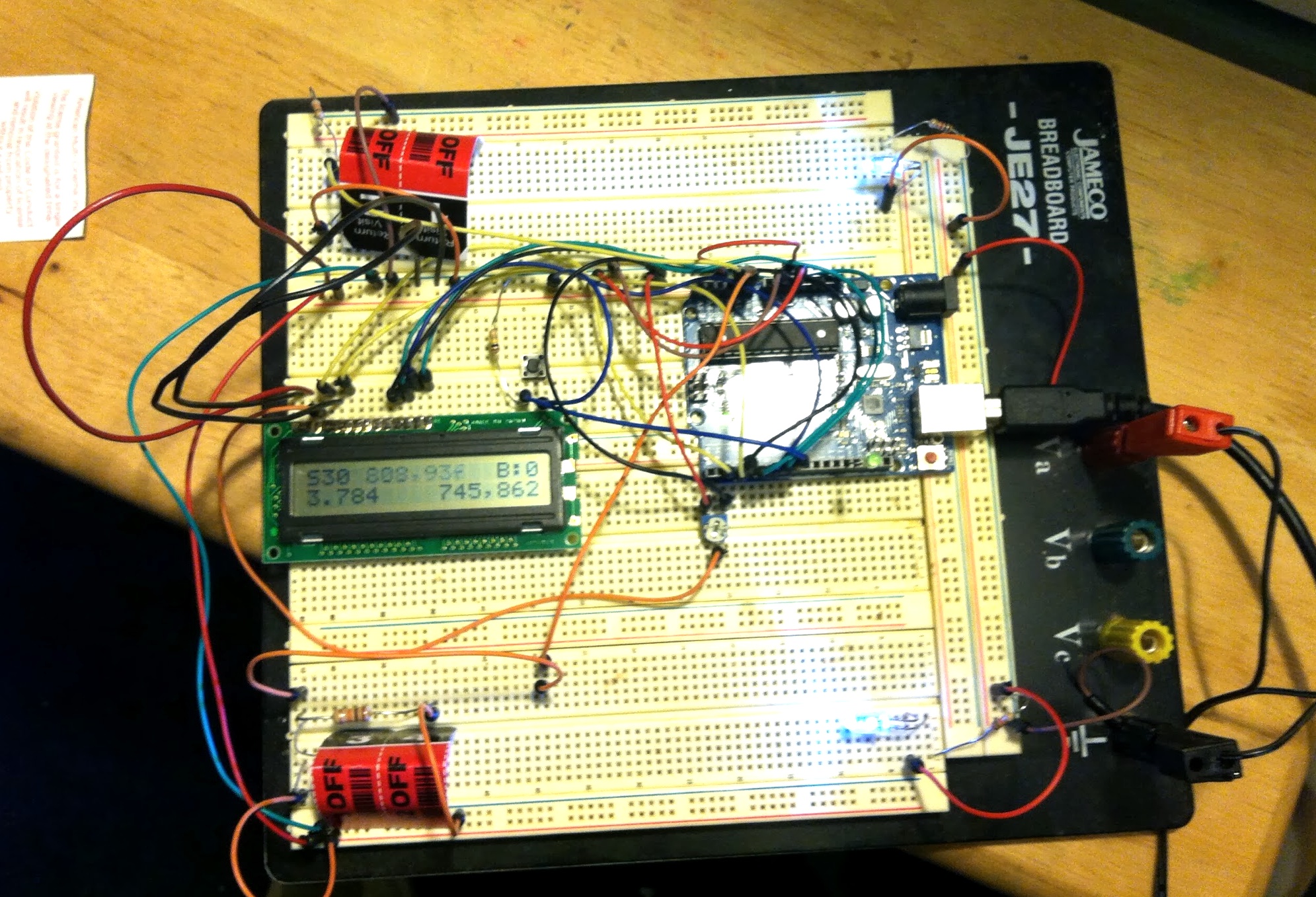 Timer with LCD and two LED/photoresistor pairs to detect start and stop times, with Sketch#30 running