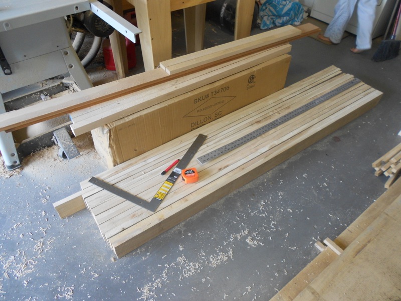 On top of the box, armoire leg blanks, cherry for drawer fronts, sycamore parts. The long slab on the floor is for my workbench project, which I started at the same time.