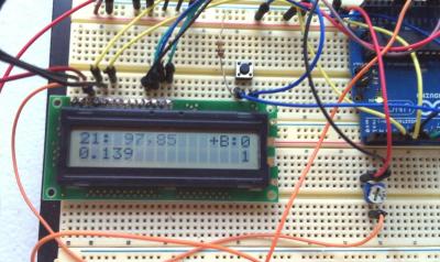 Test 21's display, showing percent values for the two optical sensors, the state of the timing button, and the most recent timing interval