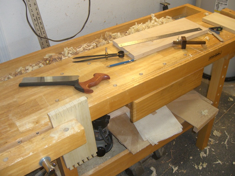 My crappy old workbench on its best day ever - practicing dovetails in 2010