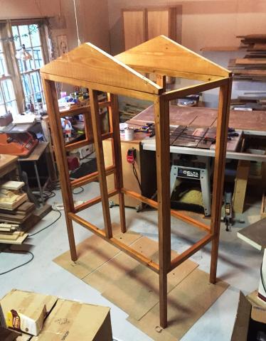 Aviary structure held together with clamps so I can stain it