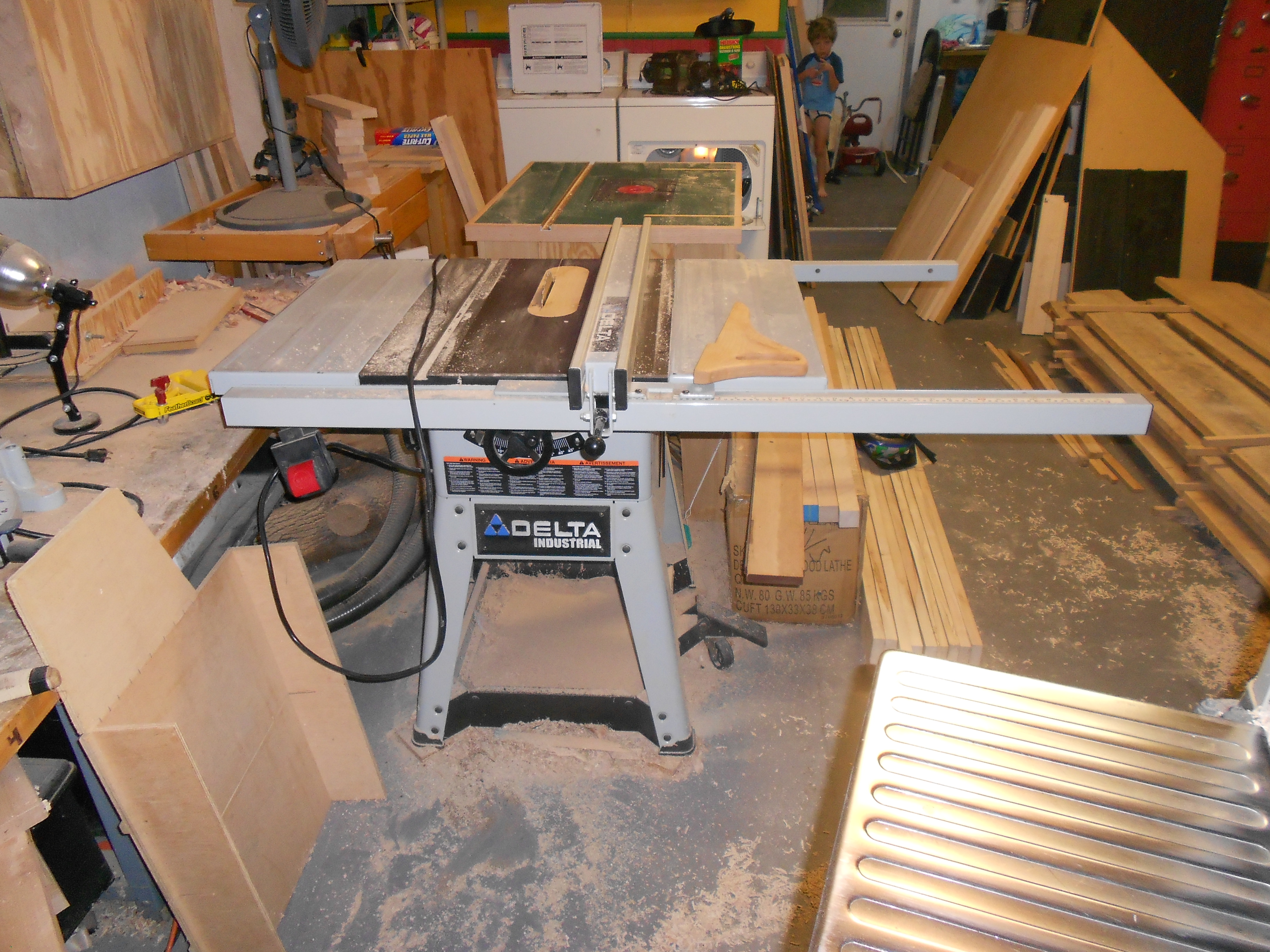 Table saw set up for ripping lumber to 4 1/2" laminate strips