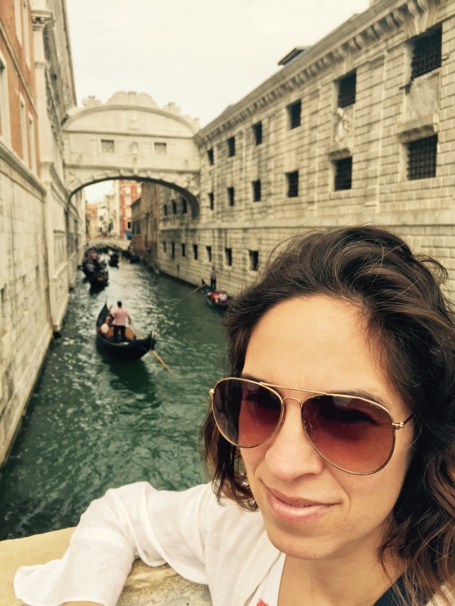 Adriana near a canal in Venice