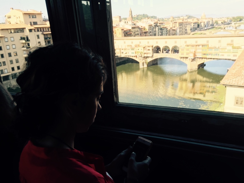 View o the Ponte Vecchio bridge from the upper floor of the Uffizi Museum