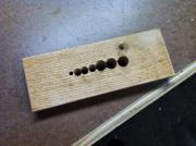 Dowel plate base with holes drilled for the dowels to pass through