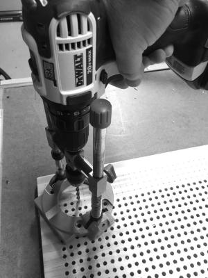 Drilling the holes using the Wolfcraft drill guide