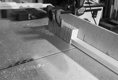 Crosscut sled set up to cut half-lap joints on the door frame parts
