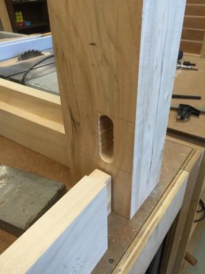 Drilling out the bulk of the mortise on one leg