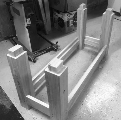 Sizing the tenons to fit the mortises in the benchtop