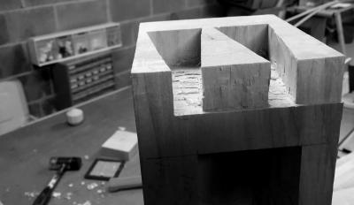 Dovetails to fit the benchfront to the endcap, sawn and carved by hand