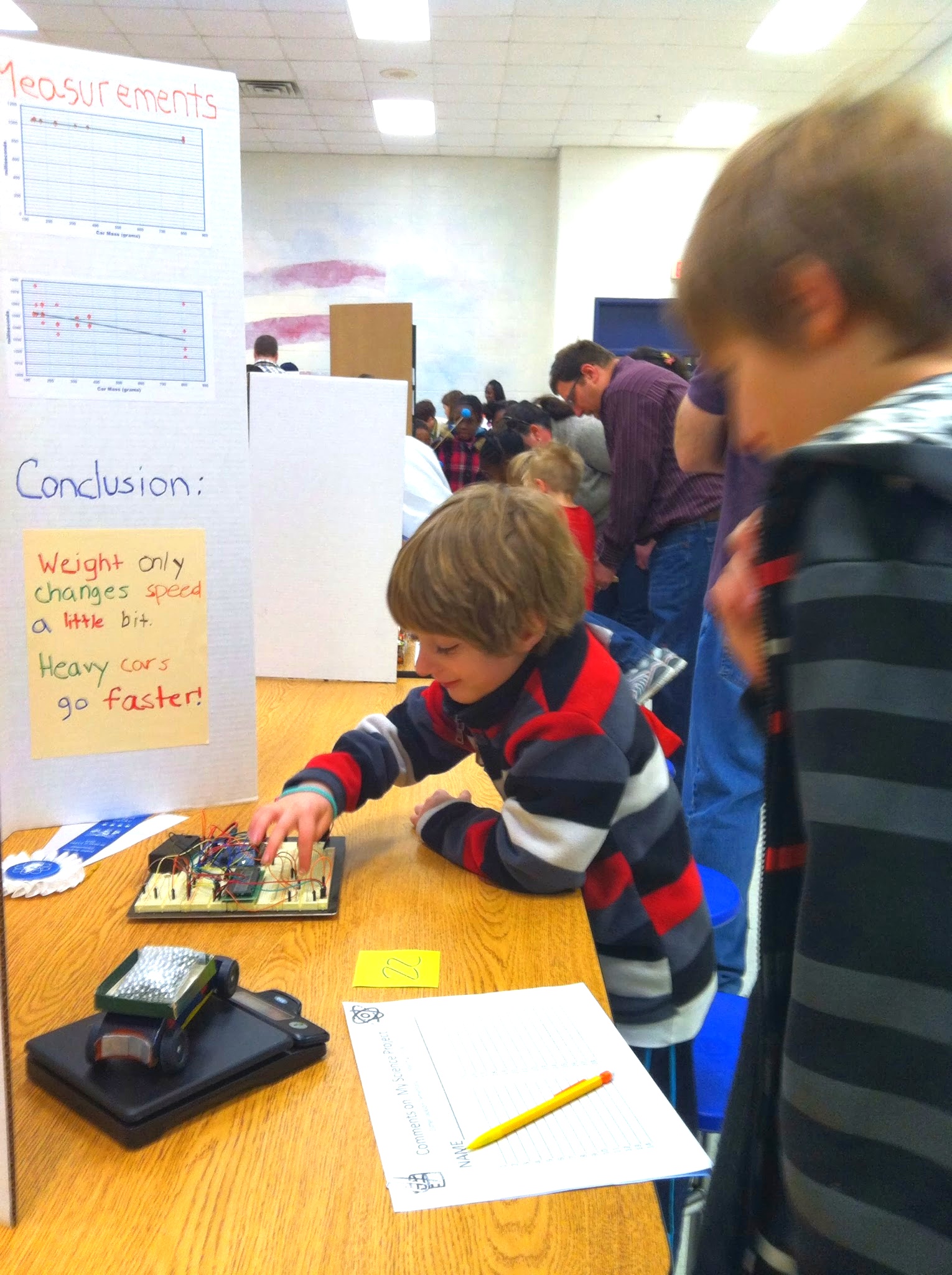 Liam showing off the timer at the science expo