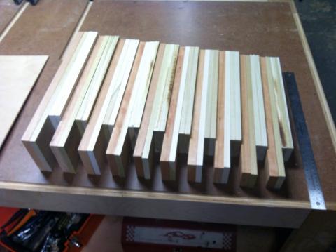 Drawer fronts, backs, and sides cut for the 10 cabinet drawers